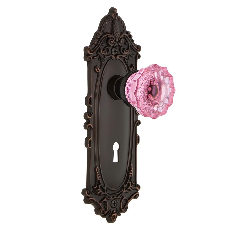 Nostalgic Warehouse VICCRP Colored Crystal Victorian Plate with Keyhole Passage Crystal Pink Glass Door Knob in Timeless Bronze